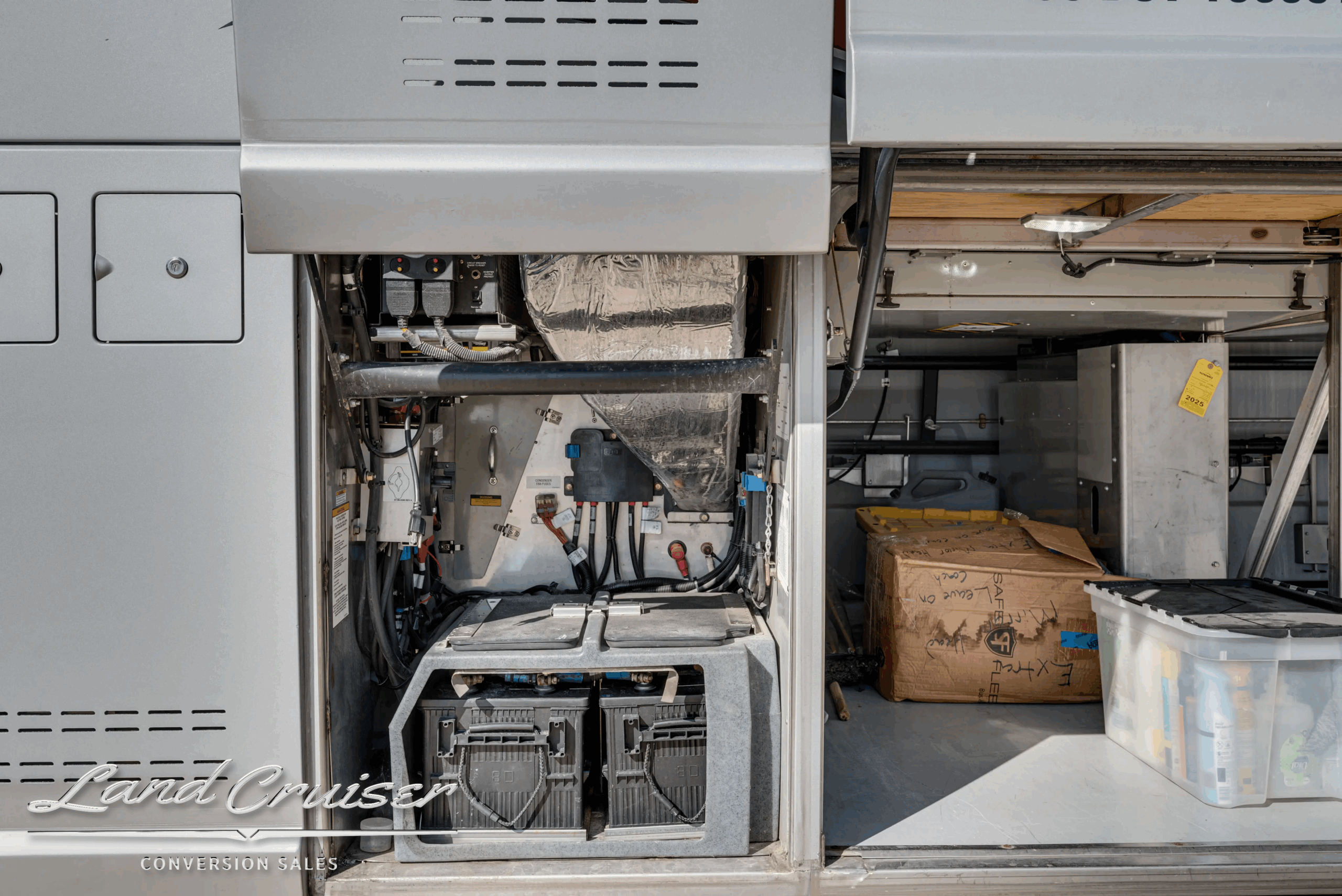 Electrical and fluid service panel near engine compartment.